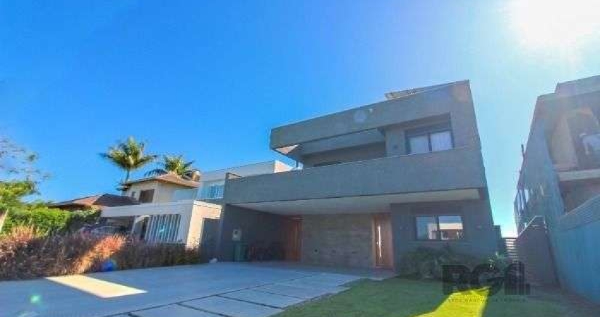 Casa Condominio em Porto Alegre, no bairro Belém Novo, com 4 dormitório(s), e 4 banheiros, à venda.
