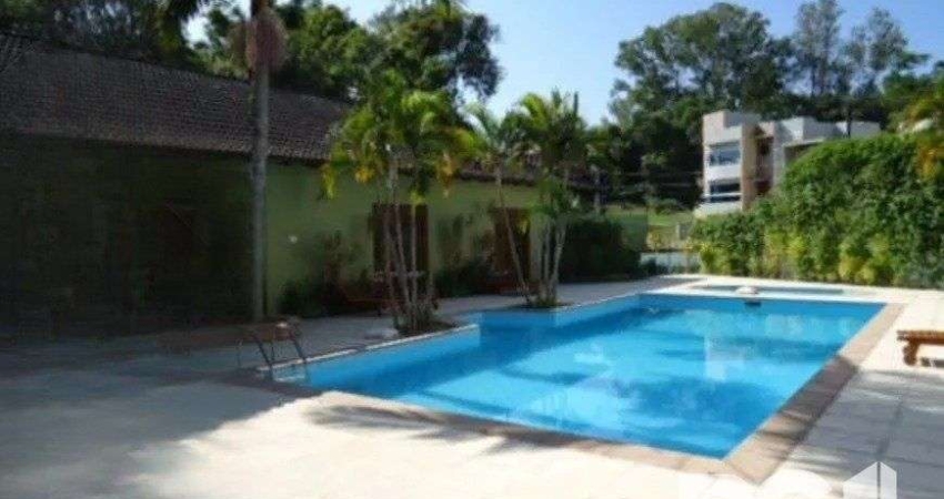 Casa em condomínio fechado com 4 quartos à venda na Rua Tocantins, 638, Lomba do Pinheiro, Porto Alegre