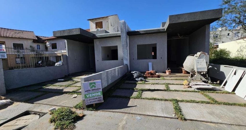 Casa com 2 quartos à venda na Rua Hilário Gonçalves Pinha, 223, Hípica, Porto Alegre
