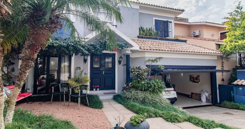 CASA DE 4 DORMITÓRIOS EM CONDOMÍNIO - 320 m² - 4 VAGAS DE GARAGEM
