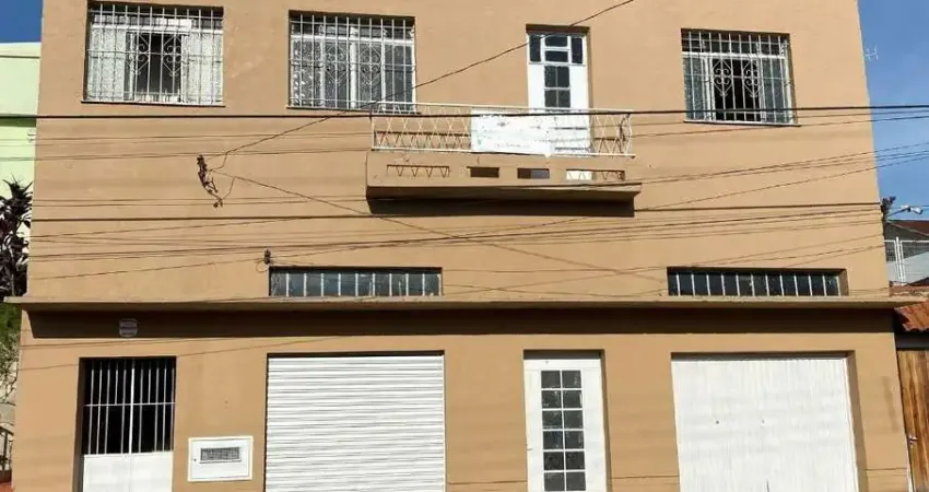 Casa com local comercial e apartamento - centro- santana do livramento-rs