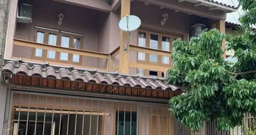 Casa com 5 quartos à venda na Rua Anhumas, 139, Jardim Algarve, Alvorada