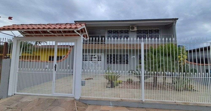 Casa com 3 quartos à venda na Rua Gaspar Martins, 979, Americana, Alvorada