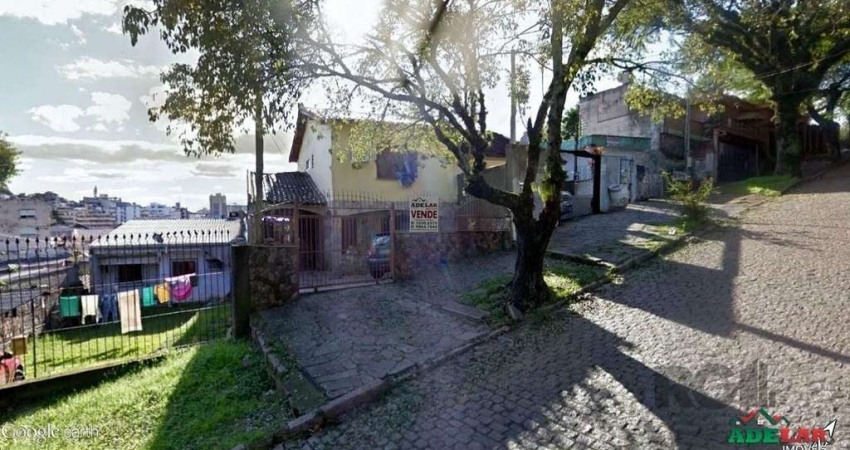 Casa com 3 quartos à venda na Avenida Teresina, 324, Medianeira, Porto Alegre