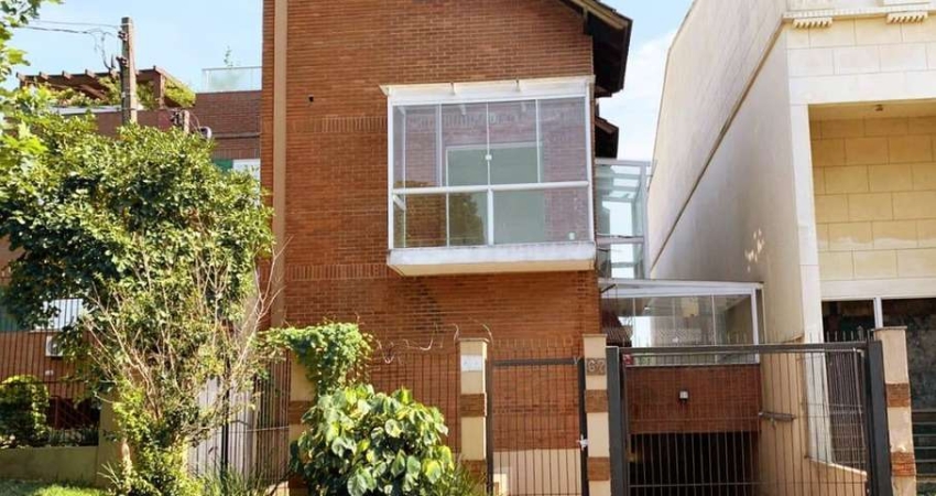 Casa em condomínio fechado com 3 quartos à venda na Rua São Leopoldo, 146, Vila Jardim, Porto Alegre