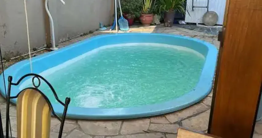 Casa com 3 quartos à venda na Rua Borgonha, 2472, Cavalhada, Porto Alegre