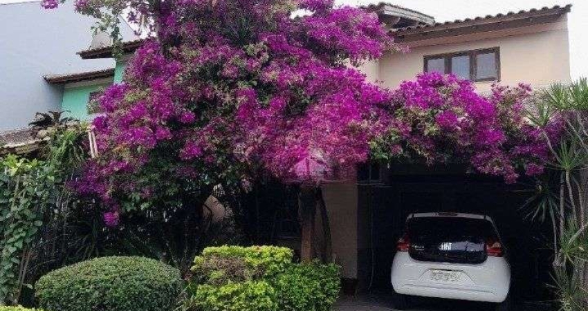 Casa 3 dormitórios para venda no bairro Hípica Condomínio Jardins do Prado.