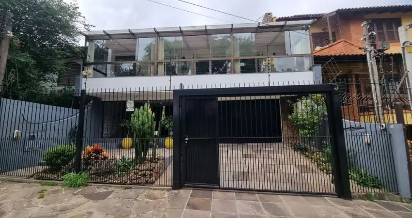 Casa com 3 quartos à venda na Rua Canto e Melo, 126, Nonoai, Porto Alegre
