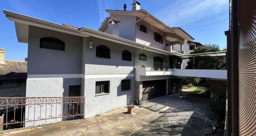 Casa com 4 quartos à venda na Rua Professor Xavier Simões, 552, Tristeza, Porto Alegre
