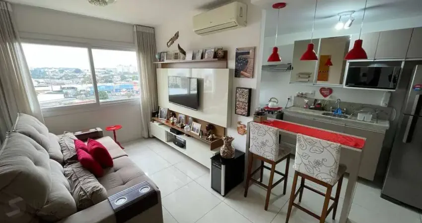 Apartamento de 2 Dormitórios, suíte, churrasqueira e 2 vagas.