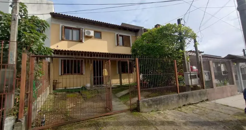 Casa com 4 quartos à venda na Rua Doutor Cláudio Walter Ferreira da Silva, 268, Guarujá, Porto Alegre