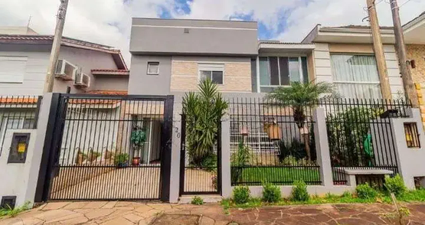 Casa em condomínio fechado com 3 quartos à venda na Rua Ronaldo Molina de Quadros, 412, Mário Quintana, Porto Alegre