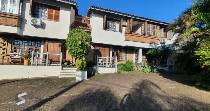 Casa em condomínio fechado com 3 quartos à venda na Avenida da Cavalhada, 6116, Cavalhada, Porto Alegre