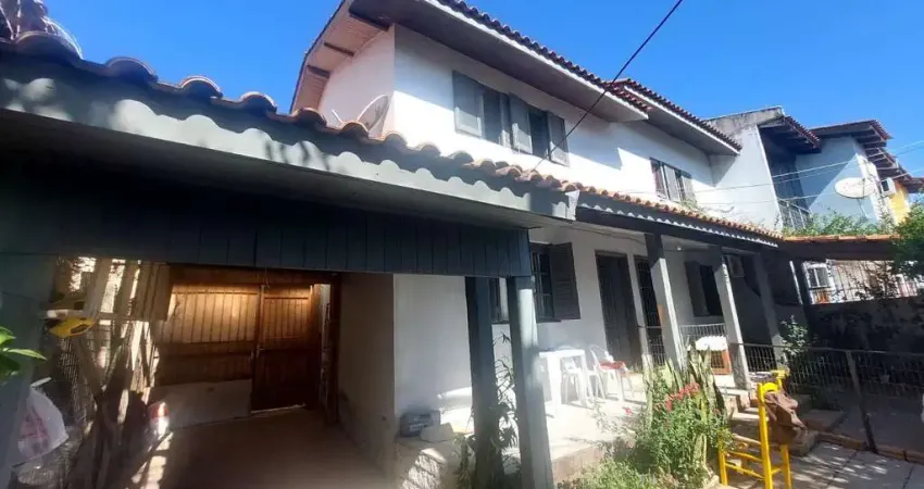 Casa com 4 quartos à venda na Rua Hermínio Leal de Albuquerque, 1104, Parque Santa Fé, Porto Alegre