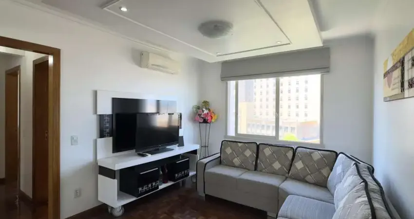Apartamento mobiliado de 71m², com 2 dormitórios, sendo 1 suíte e vaga no centro
