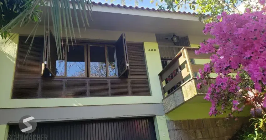 Casa com 5 quartos à venda na Rua Fernando Osório, 550, Teresópolis, Porto Alegre
