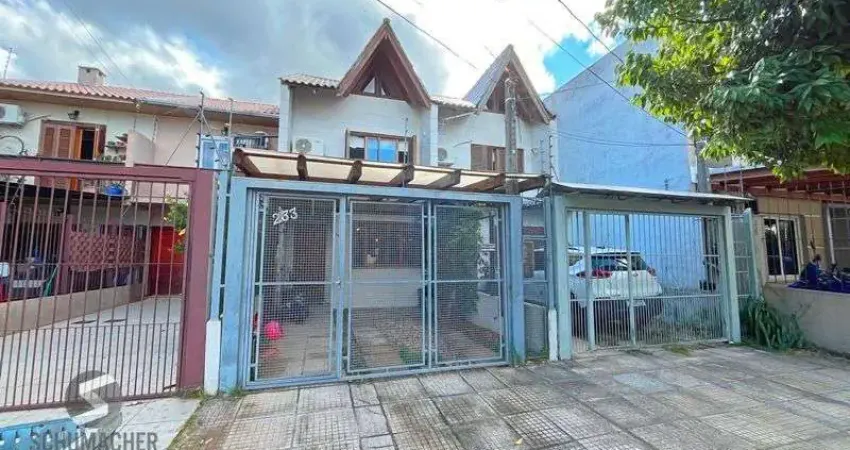 Casa com 2 quartos à venda na Rua Itacyr Rossi, 306, Guarujá, Porto Alegre