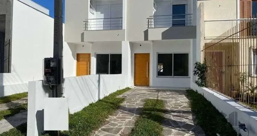 Casa com 3 quartos à venda na Rua Itacyr Rossi, 283, Guarujá, Porto Alegre