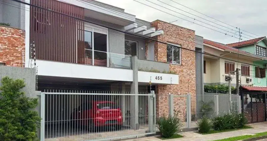 Casa contemporânea, 4 d, sendo 2 suítes, uma no térreo,206 m² , bairro tristeza