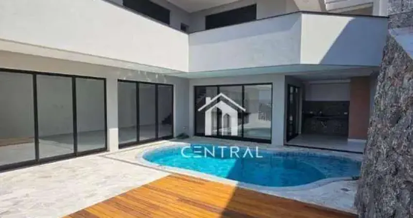 Casa em condomínio de alto padrão à venda, com 3 dormitórios sendo 3 suítes, área gourmet com piscina e cozinha, 6 vagas de garagem!