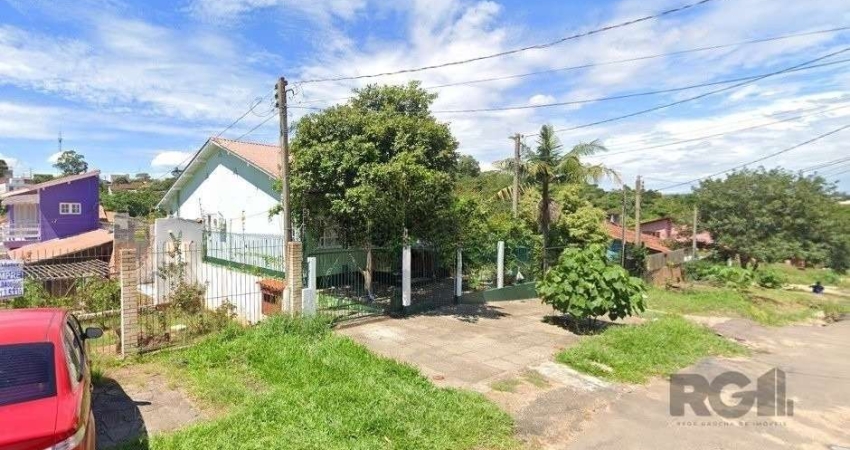 Casa com 3 quartos à venda na Rua Ênio de Souza, 226, Vila Nova, Porto Alegre