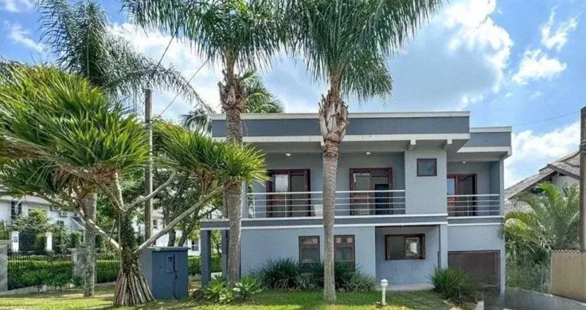 Casa com 4 quartos à venda na Rua Tocantins, 937, Lomba do Pinheiro, Porto Alegre