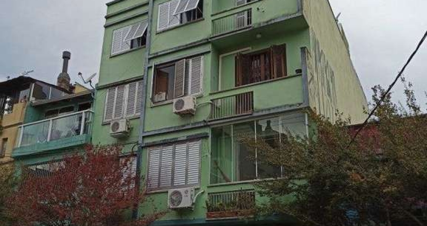 Apartamento à venda na Cidade Baixa – 2 dormitórios, de frente, com sacada integrada – Somente para investidor.