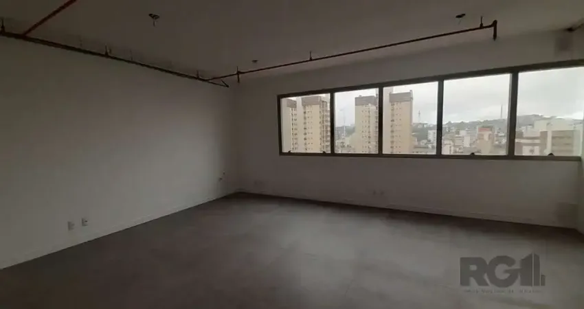 Excelente sala comercial no menino deus, com uma vaga de garagem.