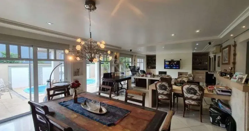 Casa em condomínio fechado com 5 quartos à venda na Rua Attílio Bilibio, 120, Jardim Carvalho, Porto Alegre