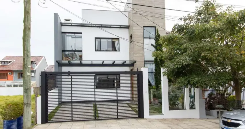 Excelente casa de alvenaria, 4 dormitórios, 2 suítes e 2 vagas de garagem.