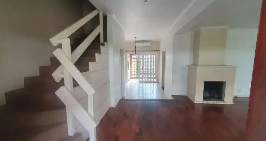 Casa em condomínio fechado com 3 quartos à venda na Avenida da Cavalhada, 6021, Cavalhada, Porto Alegre