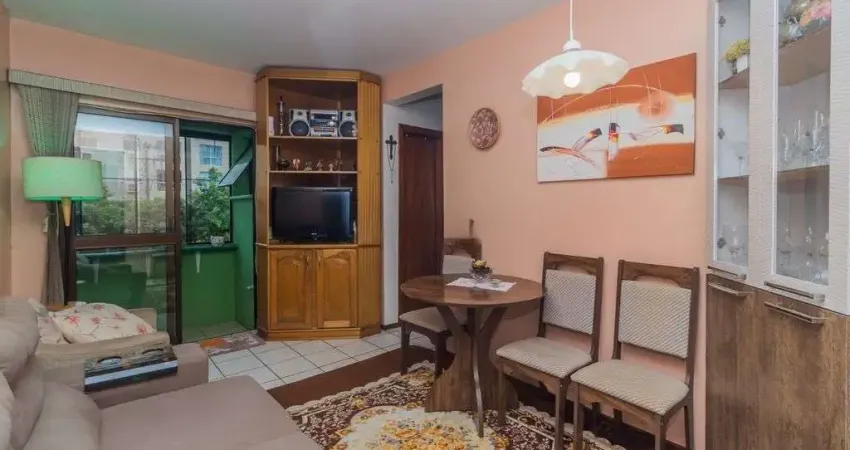 Apartamento iluminado com 2 dormitórios e vaga escriturada