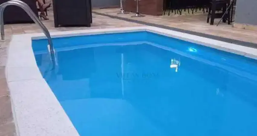 Sobrado de alto padrão com 4 suítes, piscina aquecida e energia solar!!