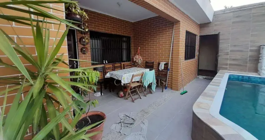 Casa com 4 dormitórios à venda, 162 m² por R$ 900.000,00 - Caiçara - Praia Grande/SP