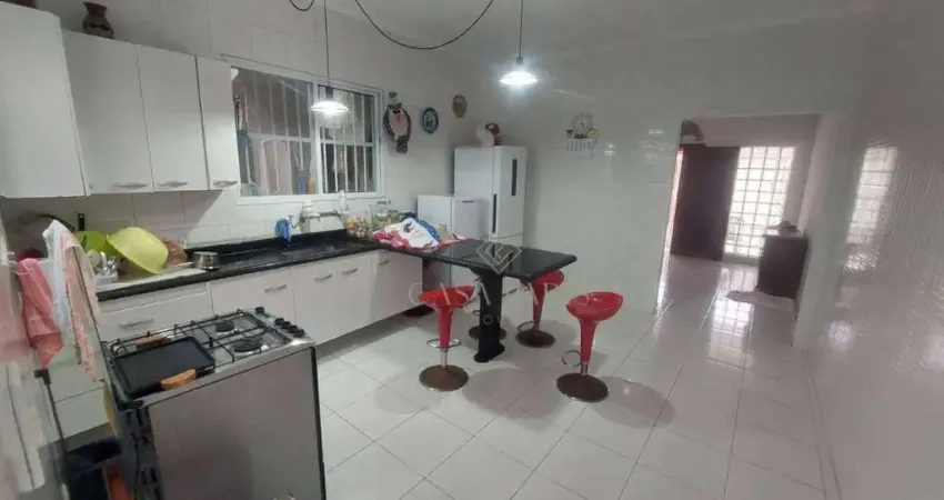Casa com 2 dormitórios à venda, 114 m² por R$ 550.000,00 - Caiçara - Praia Grande/SP