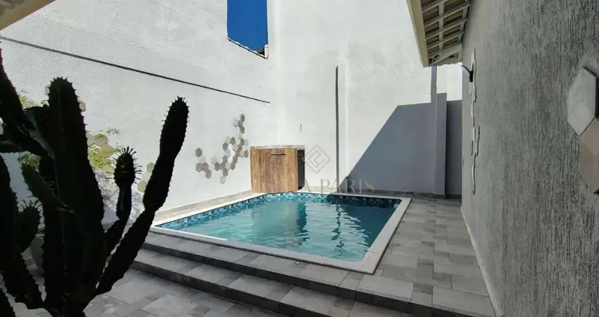 Casa com 4 dormitórios à venda, 127 m² por R$ 1.739.000,00 - Caiçara - Praia Grande/SP