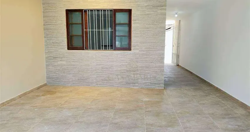 Casa com 2 dormitórios à venda, 80 m² por R$ 430.000,00 - Caiçara - Praia Grande/SP
