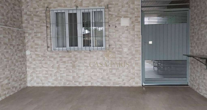 Casa com 3 dormitórios à venda, 107 m² por R$ 450.000,00 - Caiçara - Praia Grande/SP