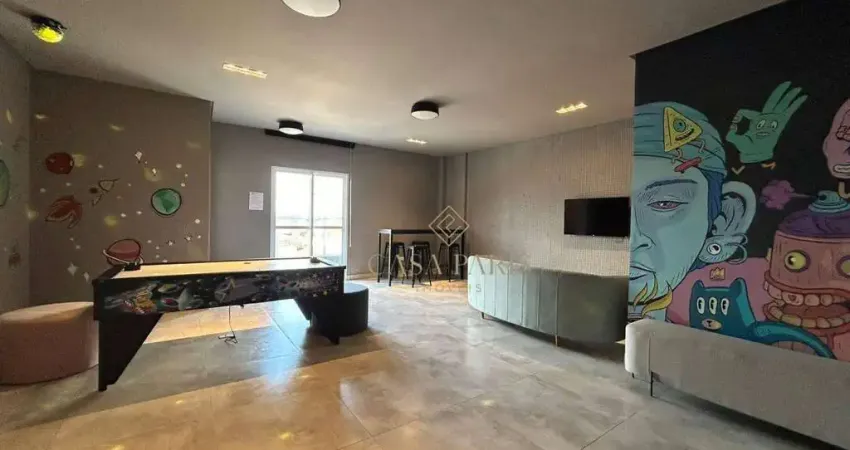Apartamento com 2 dormitórios à venda, 67 m² por R$ 580.000,00 - Caiçara - Praia Grande/SP