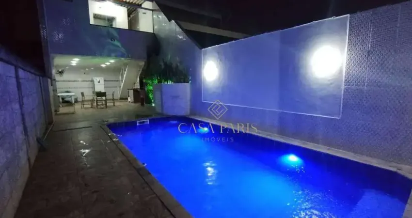 Sobrado com 3 dormitórios à venda, 155 m² por R$ 875.000 - Vila Tupi - Praia Grande/SP