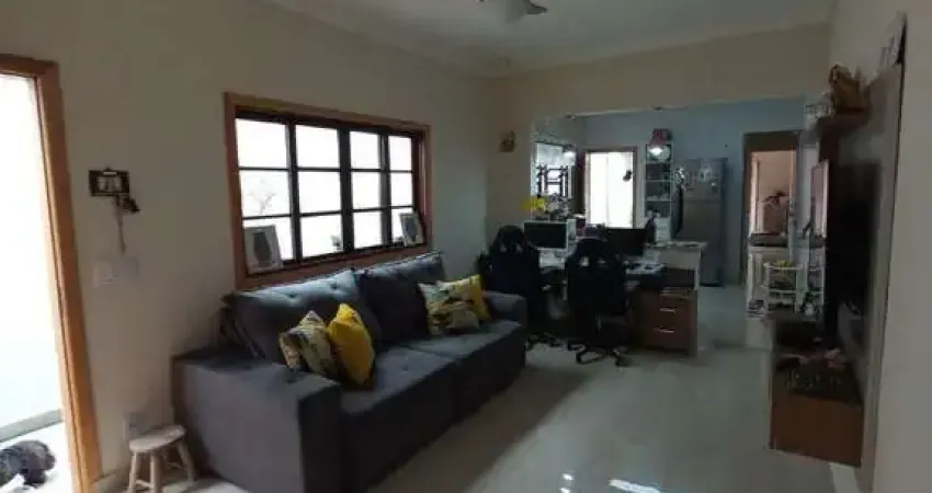 Casa com 2 dormitórios à venda, 103 m² por R$ 599.000,00 - Maracanã - Praia Grande/SP