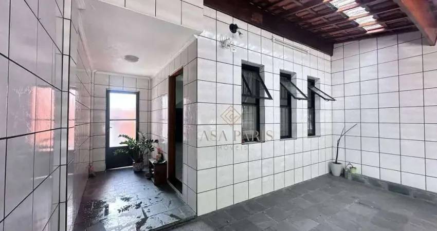 Sobrado com 3 dormitórios à venda, 120 m² por R$ 520.000,00 - Tude Bastos - Praia Grande/SP