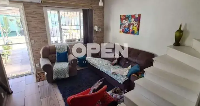 Casa em condomínio fechado com 3 quartos à venda na Avenida Guilherme Schell, Rio Branco, Canoas