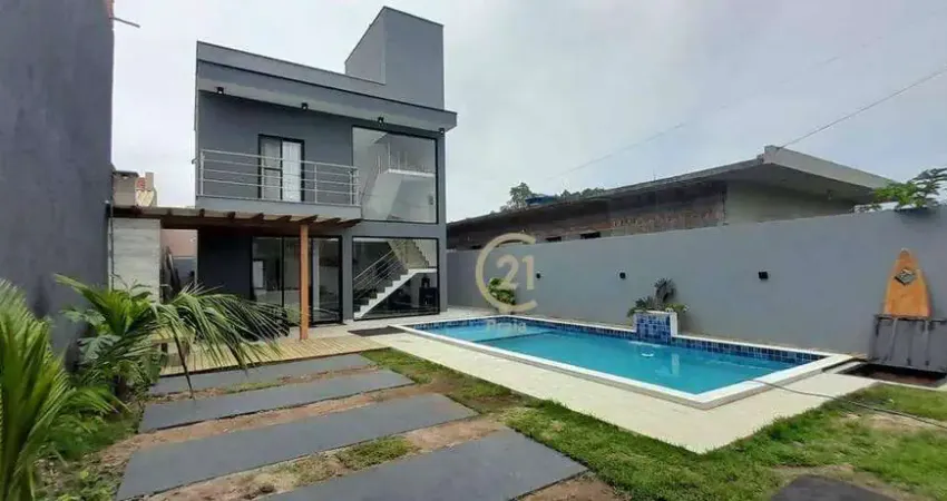 Casa com 3 dormitórios à venda, 140 m² por R$ 1.050.000 - Massaguaçu - Caraguatatuba/SP