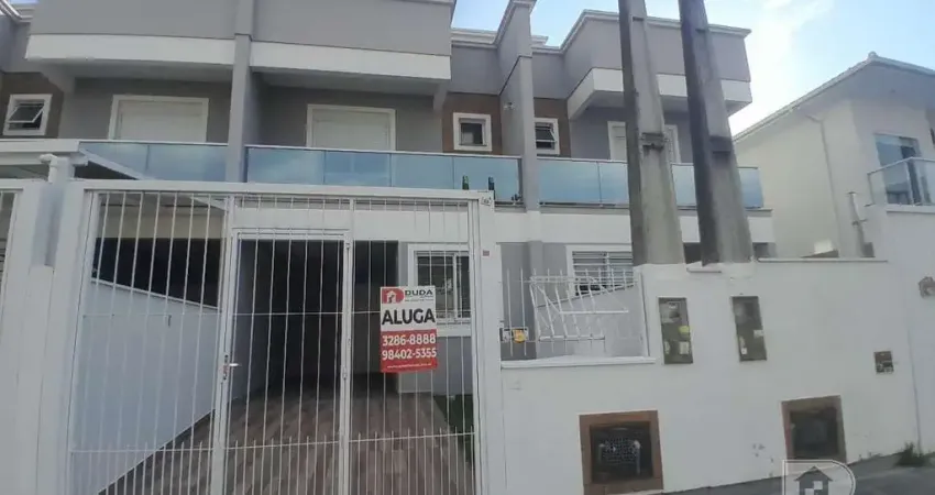 Sobrado geminado, 2 suítes na Nova Palhoça