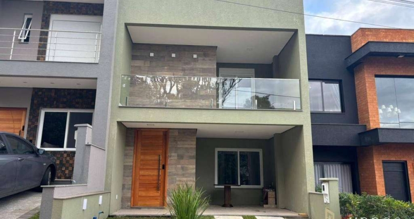Casa com 3 dormitórios à venda, 200 m² por R$ 936.000,00 - Condomínio Primavera - Gravataí/RS