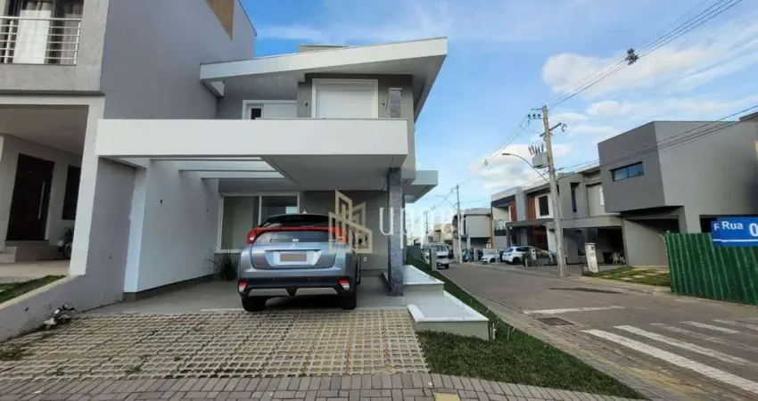Casa com 3 dormitórios à venda, 140 m² por R$ 899.000,00 - Condomínio Primavera - Gravataí/RS