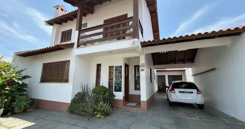Casa com 5 dormitórios à venda, 263 m² por R$ 1.590.000,00 - Salgado Filho - Gravataí/RS