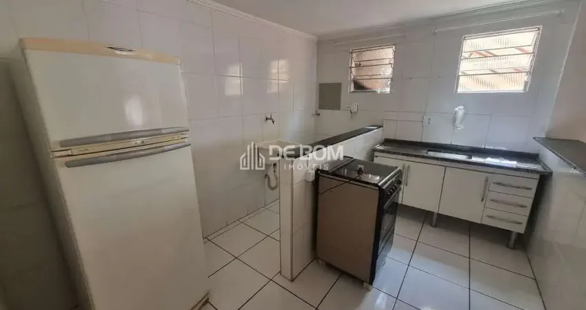 Kitnet semimobiliada para locação no centro de poços, com uma vaga de garagem, descoberta