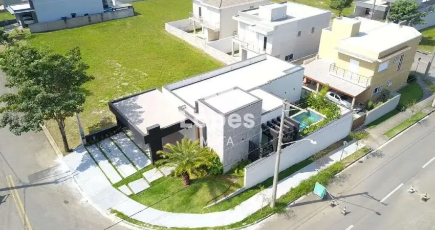 Casa moderna no condomínio terras do vale com 3 suítes, pé direito duplo, piscina e área gourmet